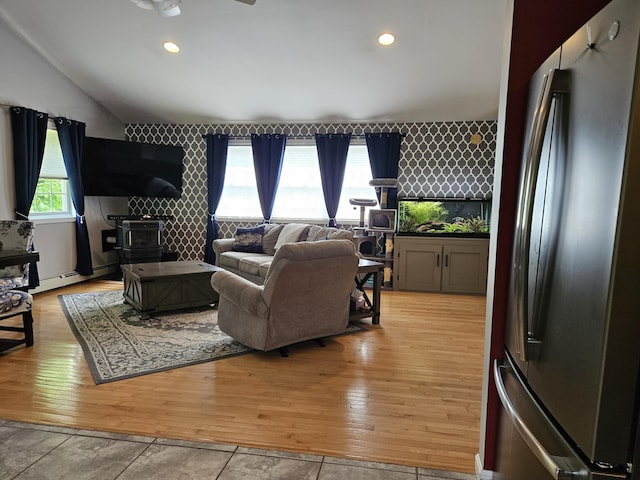 30 Cedar Breeze S, Glenburn, ME 04401 - living room with lofted ceiling, light wood-type flooring, recessed lighting, a baseboard radiator, and a ceiling fan