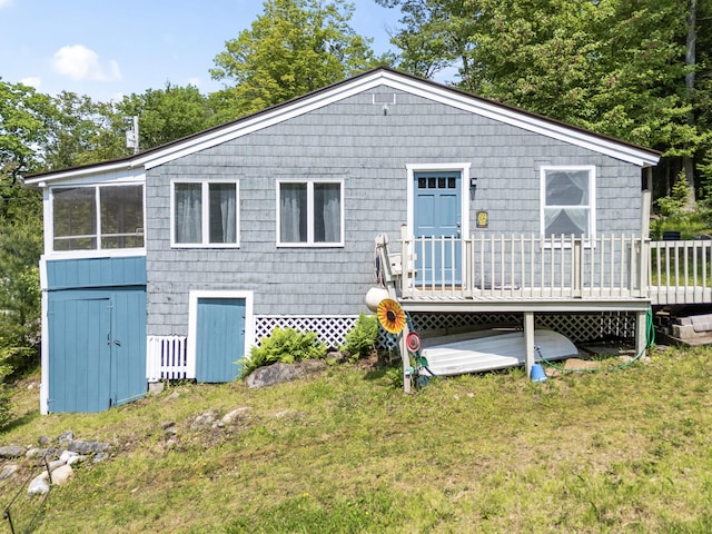 48 E Shore Dr, Greene, ME 04236 - back of house with a wooden deck and a lawn