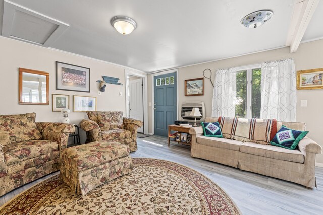 48 E Shore Dr, Greene, ME 04236 - living room featuring wood finished floors, attic access, and heating unit