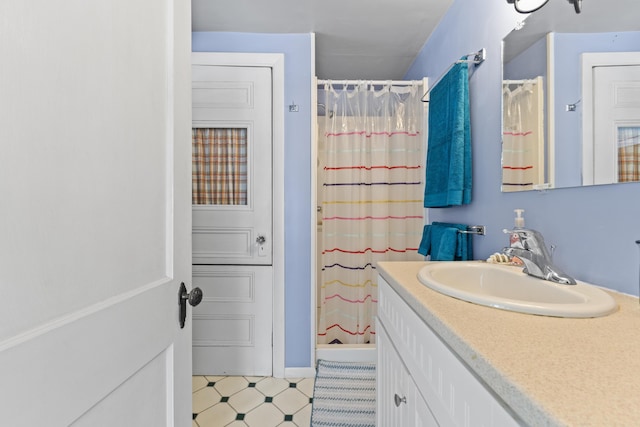 48 E Shore Dr, Greene, ME 04236 - bathroom featuring vanity, a shower with curtain, and baseboards