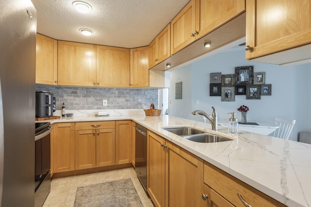 219 E Grand Ave Unit 3C, Old Orchard Beach, ME 04064 - kitchen with stainless steel appliances, decorative backsplash, light stone countertops, a textured ceiling, and light tile patterned flooring