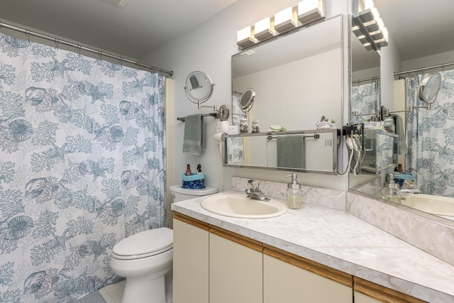 219 E Grand Ave Unit 3C, Old Orchard Beach, ME 04064 - bathroom with vanity, tile patterned floors, and curtained shower