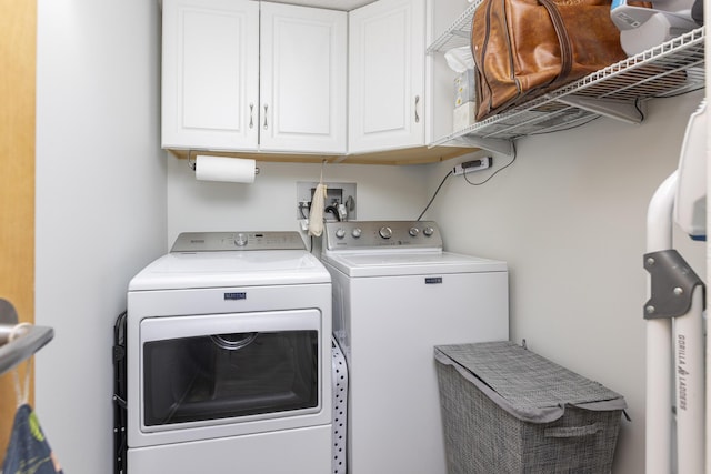 219 E Grand Ave Unit 3C, Old Orchard Beach, ME 04064 - washroom featuring washer and dryer and cabinet space