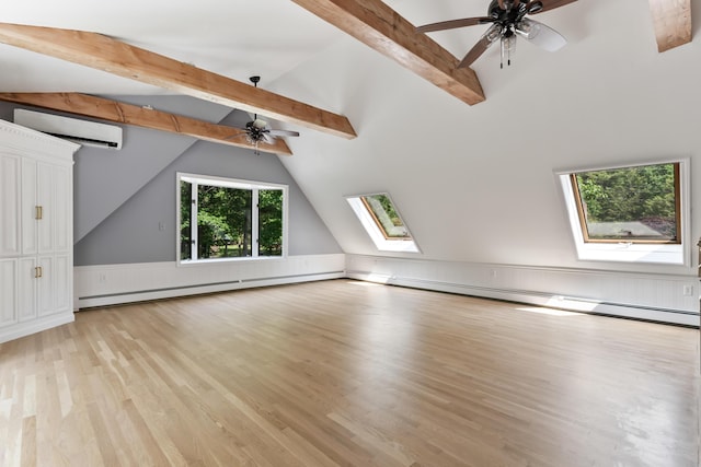 106 Fieldstone Estates Rd, York, ME 03909 - bonus room featuring a skylight, ceiling fan, an AC wall unit, light wood finished floors, and wainscoting