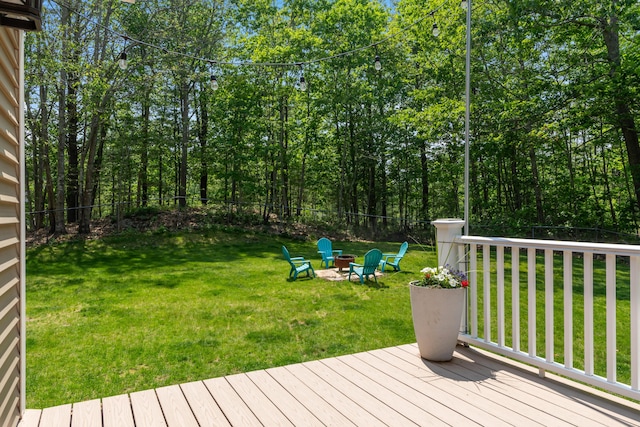 106 Fieldstone Estates Rd, York, ME 03909 - wooden deck featuring an outdoor fire pit