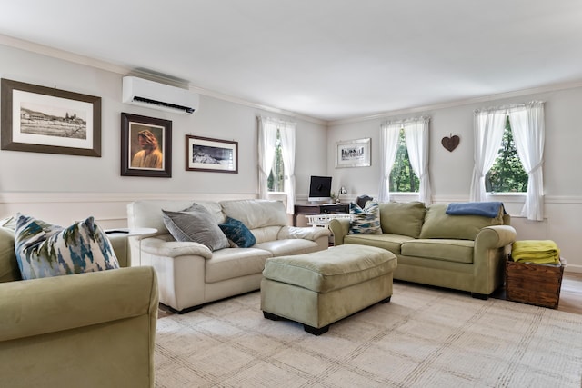 106 Fieldstone Estates Rd, York, ME 03909 - living room featuring a wall mounted air conditioner, crown molding, and light wood-style floors