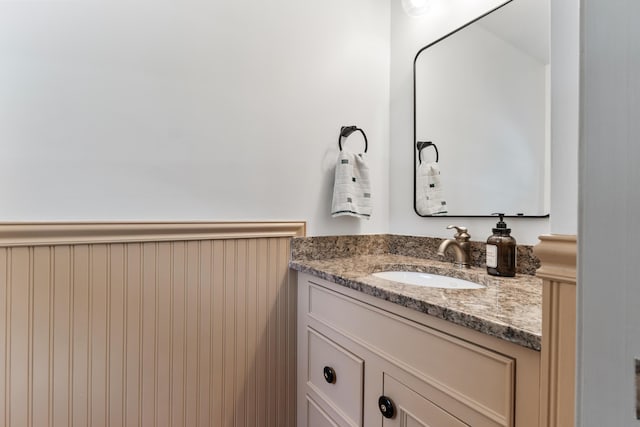 106 Fieldstone Estates Rd, York, ME 03909 - bathroom with vanity and a wainscoted wall