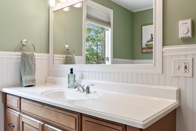 106 Fieldstone Estates Rd, York, ME 03909 - bathroom featuring wainscoting, vanity, and crown molding