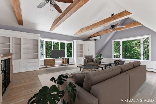 106 Fieldstone Estates Rd, York, ME 03909 - living room featuring a ceiling fan, a wall mounted AC, and light wood-type flooring