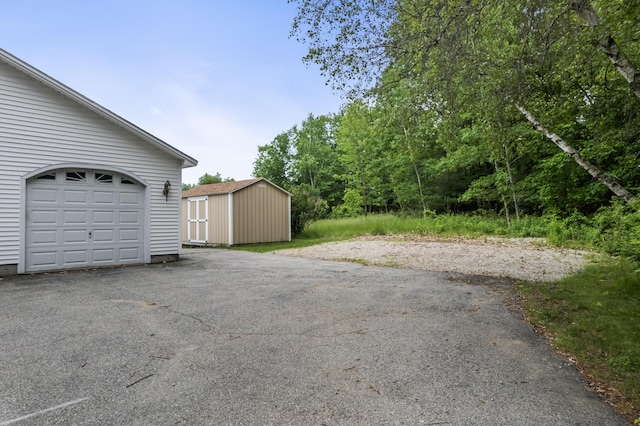 51 Burnham Rd, Saco, ME 04072 - garage with a storage unit and driveway
