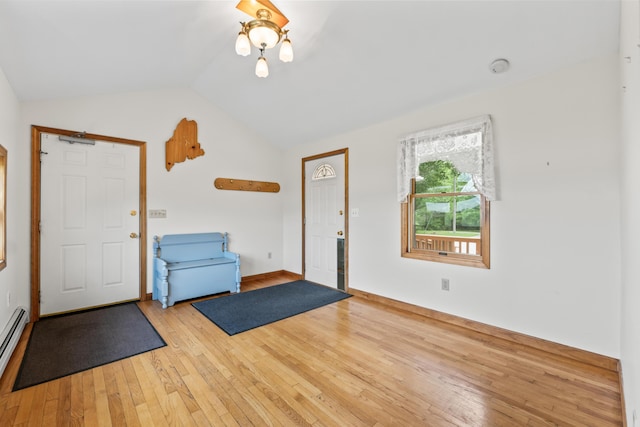 51 Burnham Rd, Saco, ME 04072 - entryway with hardwood / wood-style floors, vaulted ceiling, and a baseboard radiator