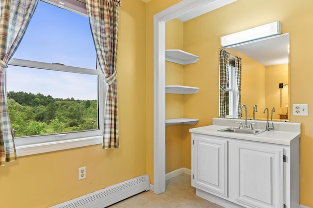 51 Burnham Rd, Saco, ME 04072 - bathroom featuring a baseboard heating unit, vanity, and baseboards