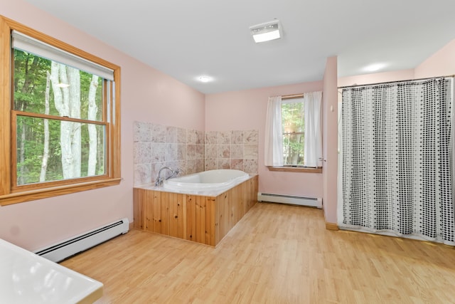 51 Burnham Rd, Saco, ME 04072 - full bathroom with baseboard heating, healthy amount of natural light, and wood finished floors