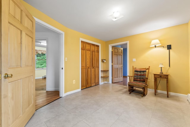 51 Burnham Rd, Saco, ME 04072 - foyer entrance featuring baseboards and a baseboard radiator