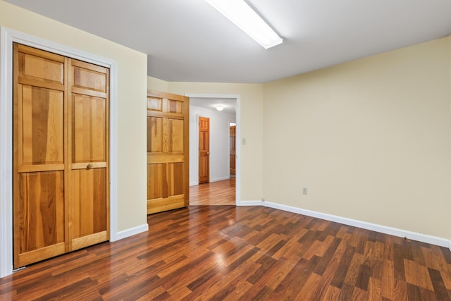 51 Burnham Rd, Saco, ME 04072 - unfurnished bedroom featuring dark wood-style floors and baseboards