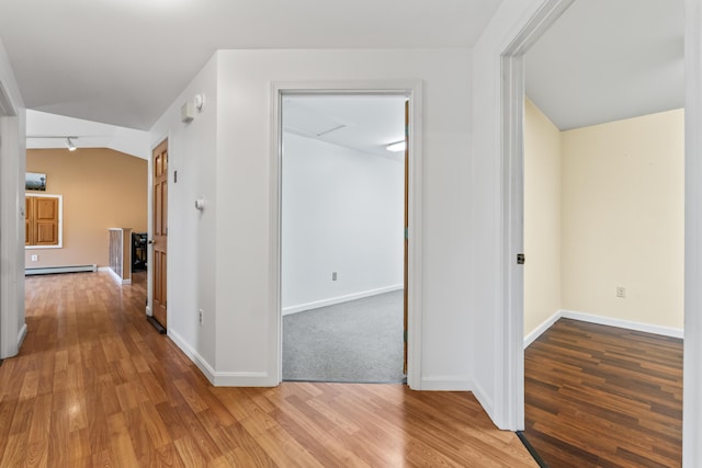 51 Burnham Rd, Saco, ME 04072 - hall featuring baseboard heating, light wood finished floors, baseboards, and lofted ceiling
