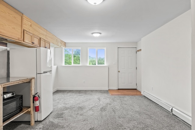 51 Burnham Rd, Saco, ME 04072 - below grade area with baseboard heating, carpet flooring, and baseboards