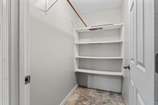 51 Burnham Rd, Saco, ME 04072 - walk in closet featuring stone finish floors