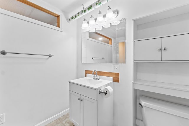51 Burnham Rd, Saco, ME 04072 - half bath with vanity, toilet, and baseboards