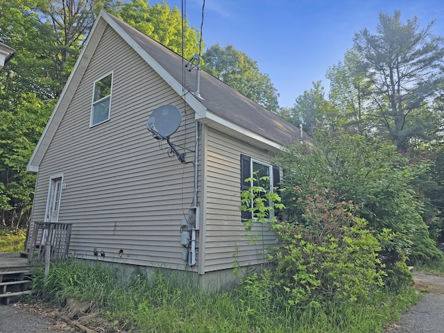 157 Ralph Richardson Rd, Norway, ME 04268 - view of side of home featuring a wooden deck