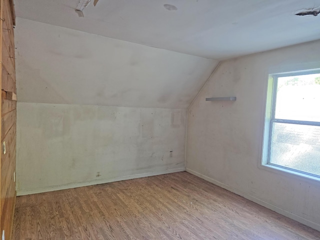 157 Ralph Richardson Rd, Norway, ME 04268 - bonus room with wood finished floors, lofted ceiling, and baseboards