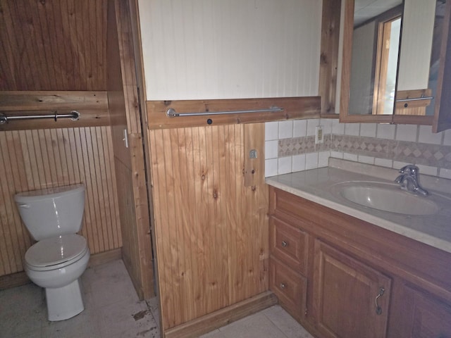 157 Ralph Richardson Rd, Norway, ME 04268 - bathroom featuring vanity, toilet, backsplash, and tile patterned flooring