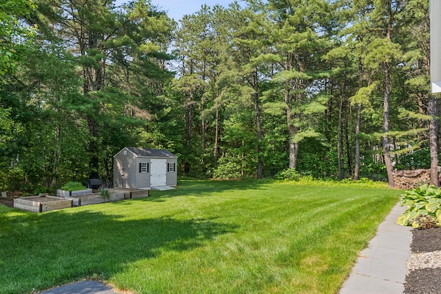3 Bradfield Way, Kennebunk, ME 04043 - view of green lawn with a garden and a shed