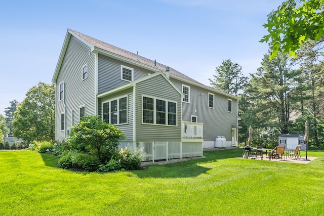 3 Bradfield Way, Kennebunk, ME 04043 - rear view of property with a yard, a patio area, and a shed