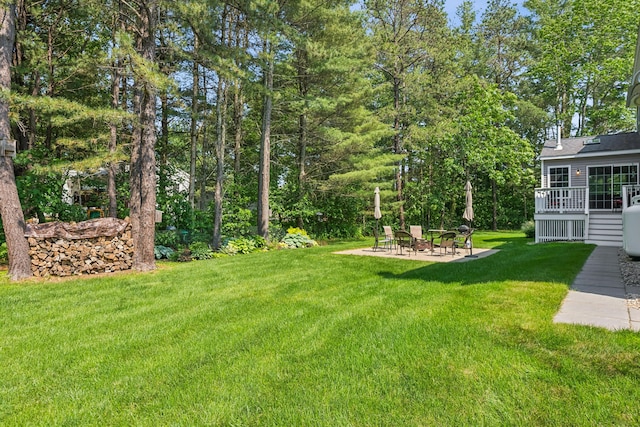 3 Bradfield Way, Kennebunk, ME 04043 - view of grassy yard with a fire pit, a deck, and a patio