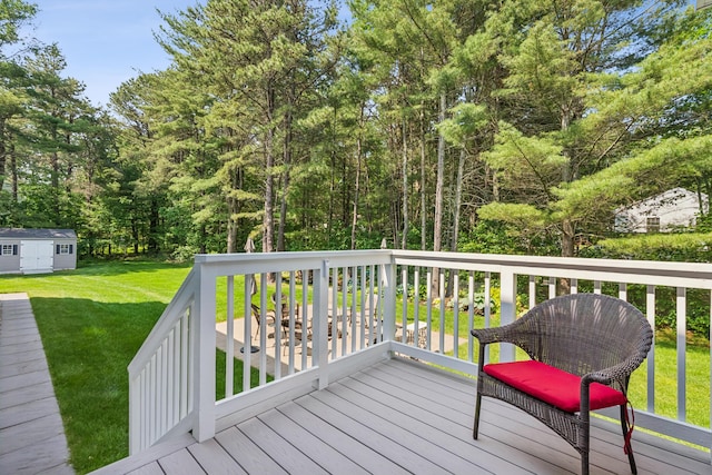 3 Bradfield Way, Kennebunk, ME 04043 - deck with a lawn and an outbuilding
