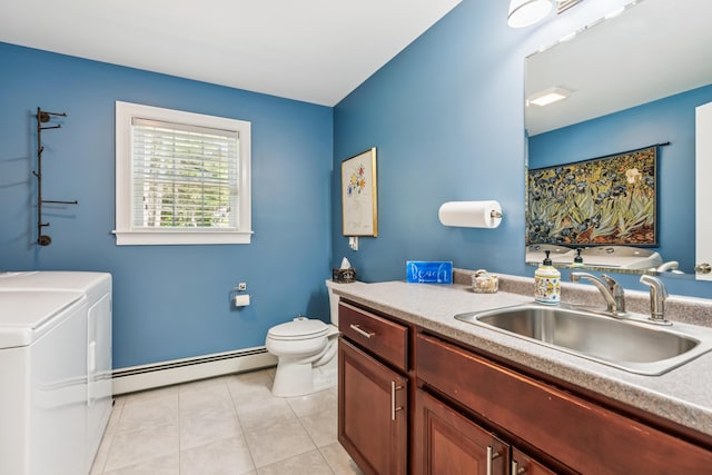 3 Bradfield Way, Kennebunk, ME 04043 - bathroom featuring a baseboard radiator, separate washer and dryer, vanity, tile patterned flooring, and a bath