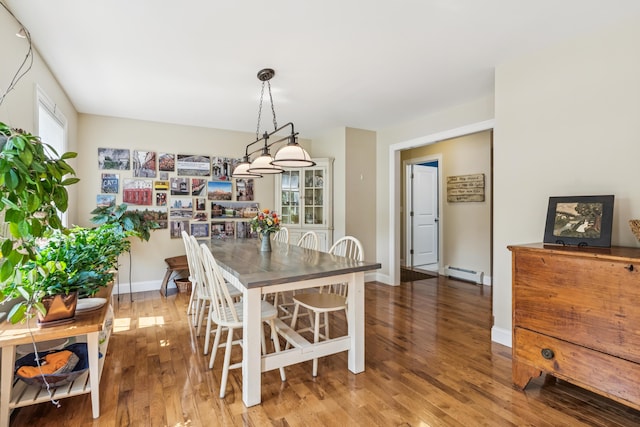 3 Bradfield Way, Kennebunk, ME 04043 - dining space featuring a baseboard radiator and wood finished floors