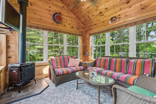3 Bradfield Way, Kennebunk, ME 04043 - sunroom / solarium with a wood stove, lofted ceiling, and plenty of natural light
