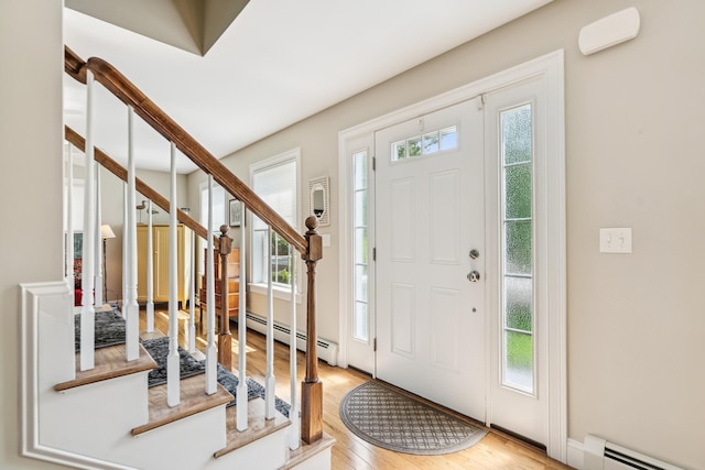 3 Bradfield Way, Kennebunk, ME 04043 - foyer with baseboard heating, plenty of natural light, and wood finished floors