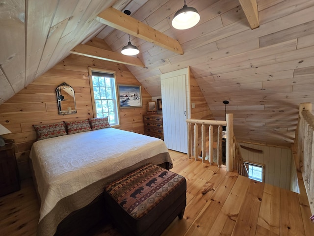 224 Maynard Rd Unit T1 R1, Nbkp, ME 04478 - bedroom with wooden walls, vaulted ceiling, and hardwood / wood-style floors