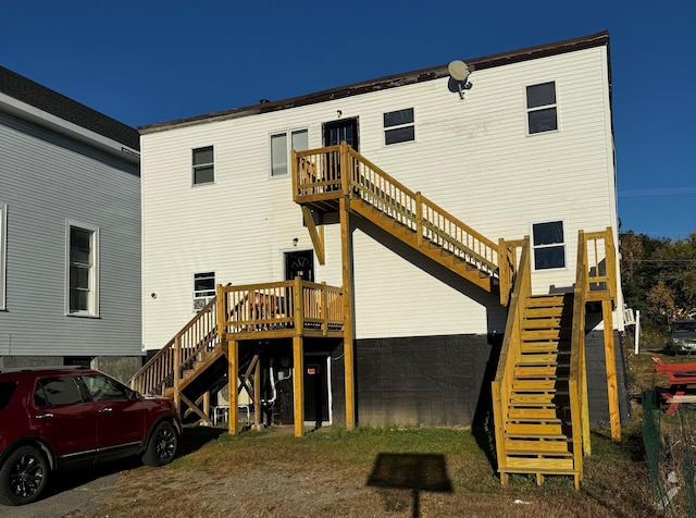 6 Main St, Howland, ME 04448 - rear view of house featuring stairs and a deck