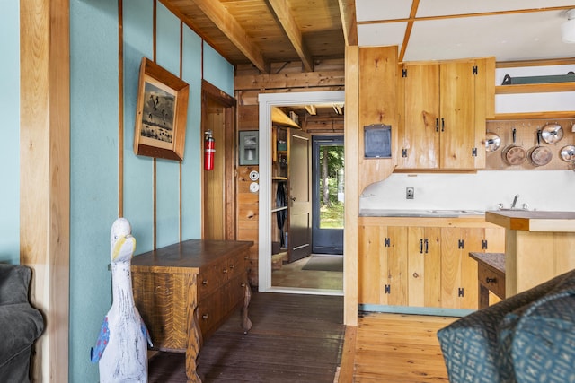 36 Cove Ln, Damariscotta, ME 04543 - kitchen with hardwood / wood-style flooring, wooden walls, and wood ceiling with exposed beams