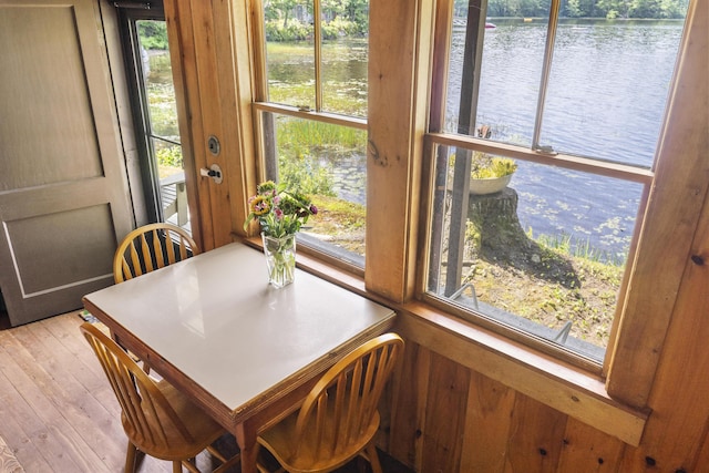36 Cove Ln, Damariscotta, ME 04543 - dining space featuring a water view, plenty of natural light, and wood finished floors