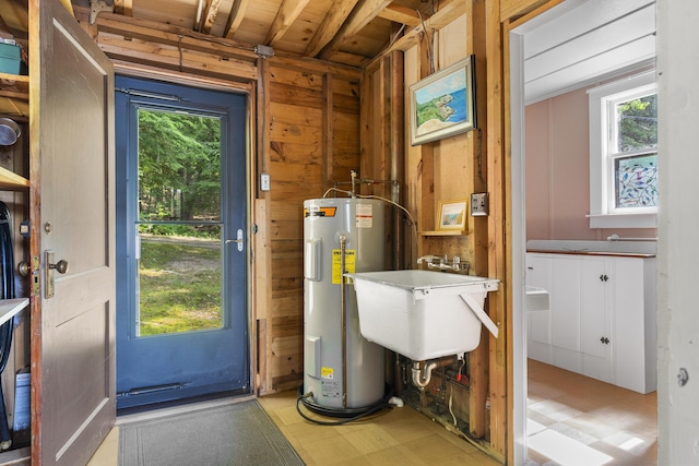 36 Cove Ln, Damariscotta, ME 04543 - utility room featuring water heater and a sink