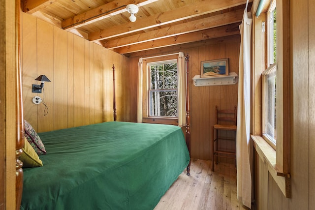 36 Cove Ln, Damariscotta, ME 04543 - bedroom with wood ceiling with exposed beams, wood walls, and light wood finished floors