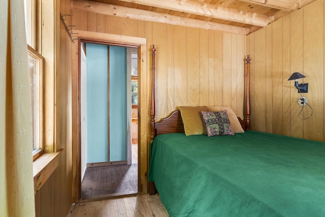 36 Cove Ln, Damariscotta, ME 04543 - bedroom with hardwood / wood-style flooring, wood walls, wooden ceiling with exposed beams, and multiple windows
