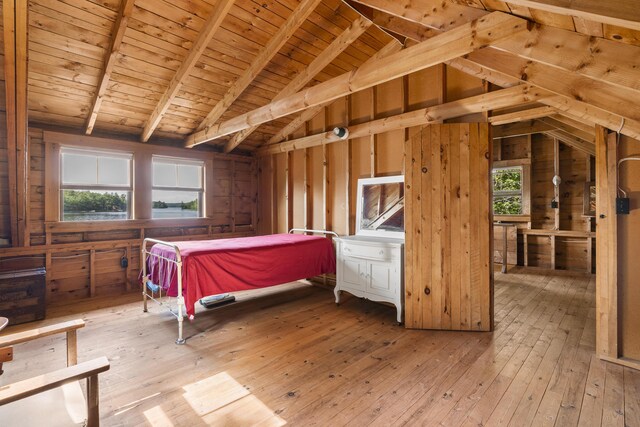 36 Cove Ln, Damariscotta, ME 04543 - bedroom featuring hardwood / wood-style flooring, multiple windows, wooden ceiling, and wood walls