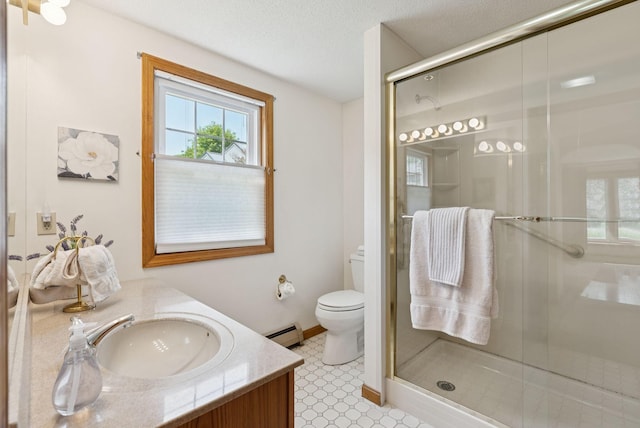 44 Meadowbrook Dr Unit 4, Gorham, ME 04038 - full bath featuring baseboard heating, vanity, toilet, and a shower stall