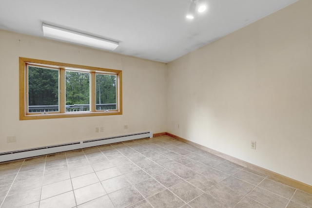 31 W Bay Bridge Rd, Topsham, ME 04086 - empty room with a baseboard heating unit and light tile patterned floors