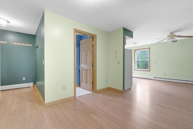 31 W Bay Bridge Rd, Topsham, ME 04086 - empty room featuring ceiling fan, a baseboard radiator, and wood finished floors