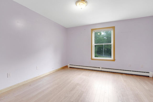 31 W Bay Bridge Rd, Topsham, ME 04086 - spare room with baseboard heating and light wood finished floors