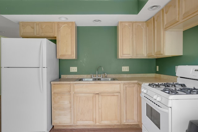 31 W Bay Bridge Rd, Topsham, ME 04086 - kitchen with white appliances, light brown cabinetry, light countertops, and recessed lighting