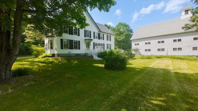 1835 Main St, Fayette, ME 04349 - rear view of house featuring a yard