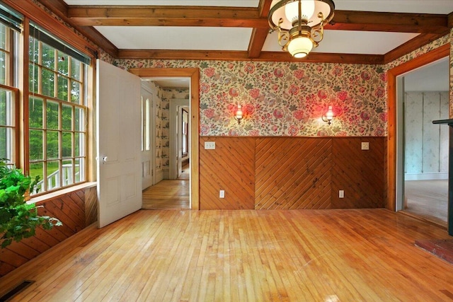 1835 Main St, Fayette, ME 04349 - spare room with wallpapered walls, hardwood / wood-style floors, a wainscoted wall, and beam ceiling