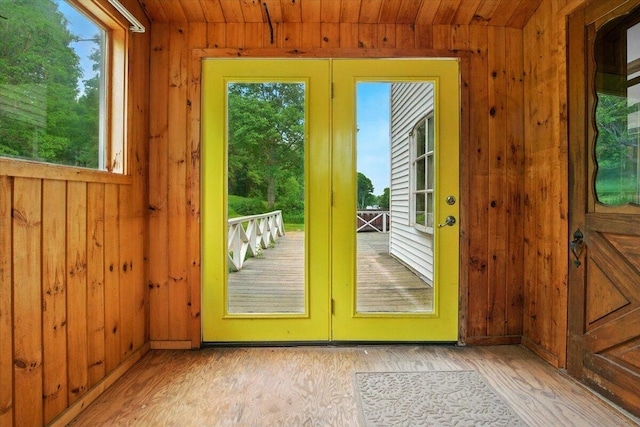 1835 Main St, Fayette, ME 04349 - doorway with wooden walls, wood ceiling, and light wood-style floors
